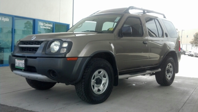 2004 NISSAN XTERRA XE gold 4 doorantilock brakescd playercenter consoledriver air bagipodmp3