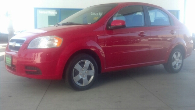 2011 CHEVROLET AVEO LS red we will protect your investment  with a warranty  for up to 3000 miles