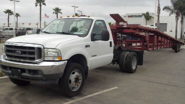 2003 FORD F450 white this is a nice truck if u want to start your own business or just expand your
