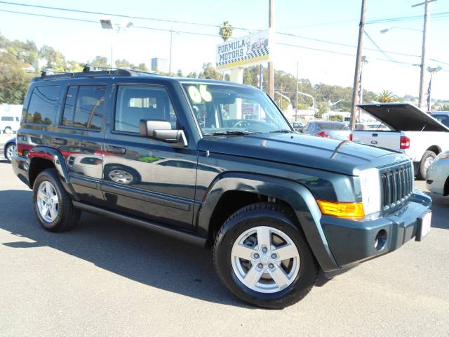2006 JEEP COMMANDER SPORT green we have 2 of these in stock and they both have all power options a