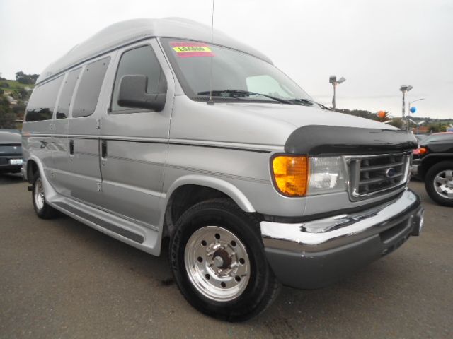 2004 FORD ECONOLINE E-250 silver this is a very clean bubble top conversion van inside and out   