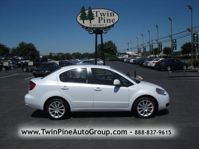 Tothego - 2011 Suzuki SX4 Sedan_1