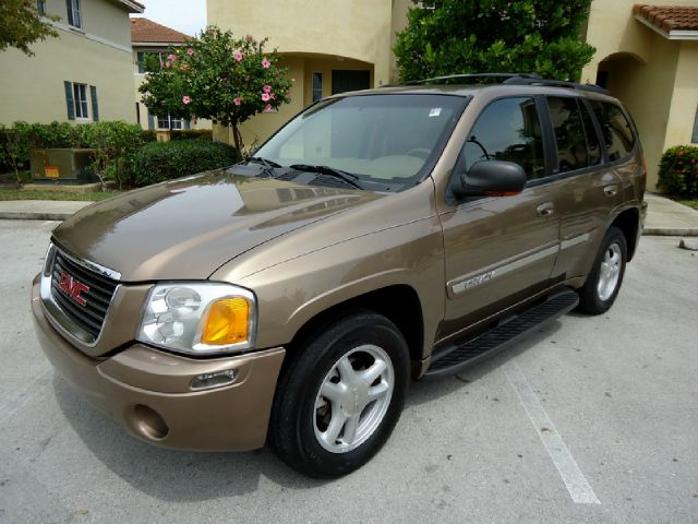 2003 GMC ENVOY SLT 2WD bronze all electrical and optional equipment on this vehicle have been chec